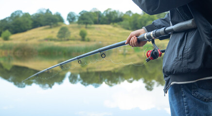 Fisherman catches fish. Fishing. Hobby