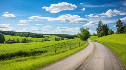 A country road leading through a tranquil countryside