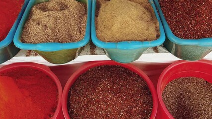 Nuts and Spices Market in Tashkent, Uzbekistan - June 29, 2023: Goods and traders at the Oriental Bazaar in Uzbekistan. The Chorsu market was known back in the Middle Ages. 4K