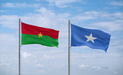 Somalia and Burkina Faso flags, country relationship concept