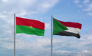 Sudan and Burkina Faso flags, country relationship concept