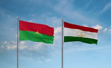 Tajikistan and Burkina Faso flags, country relationship concept