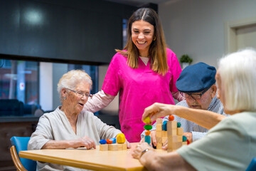 Nurse and elder people playing skill games