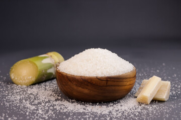 Fototapeta na wymiar Gula Pasir Putih or White Sand Sugar with Sugar Cane.