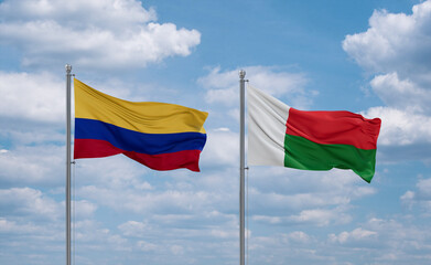 Madagascar and Colombia flags, country relationship concept