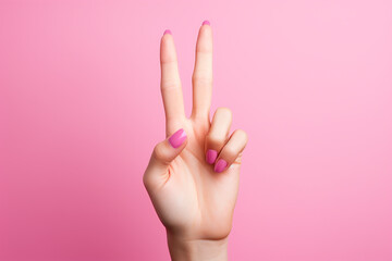 Generative AI Image of Girl Hand with Two Fingers Symbolize Peace on Pink Background - obrazy, fototapety, plakaty