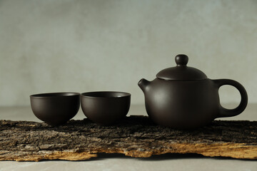 Asian tea concept, teapot and two cups.