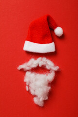 Obraz na płótnie Canvas Santa's hat with a beard and mustache