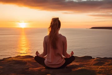 Fototapeten Peaceful meditation at sunset. © Zaleman