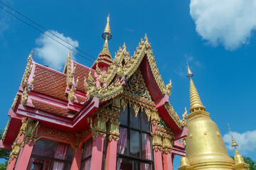Fototapeta premium Temple pavilion and golden pagoda