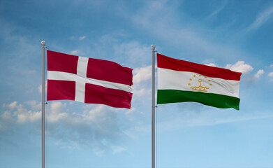 Tajikistan and Denmark flags, country relationship concept