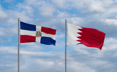 Bahrain and Dominican flags, country relationship concept