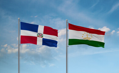 Tajikistan and Dominican flags, country relationship concept