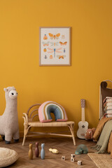 Stylish composition of child room interior with mock up poster frame, yellow wall, plush toys, monkey, rattan sideboard, guitar, brown bedding and personal accessories. Home decor. Template.
