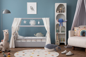 Creative composition of child room interior with mock up poster frame, cozy bed, stylish rack, blue wall, rack with toys, plush lama, gray lamp, guitar and personal accessories. Home decor. Template. - obrazy, fototapety, plakaty