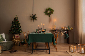 Interior design of christmas dinning room interior with table, christmas tree, chair, wreath,...