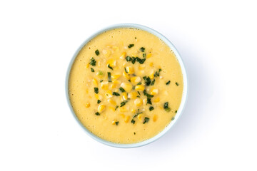 Corn soup in green bowl isolated on white background. Top view