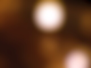 Abstract blur background image of gold color gradient used as an illustration. Designing posters or advertisements.