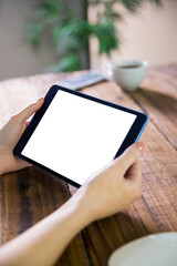 Digital png photo of hands of caucasian woman holding tablet on transparent background