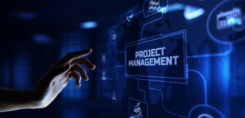 Project management planning business development. Hand pressing button on screen.