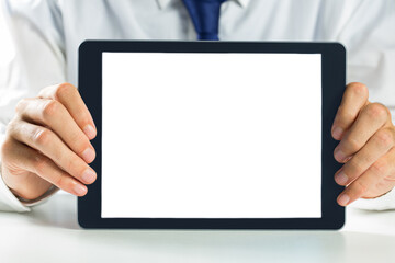 Digital png photo of caucasian businessman holding tablet with copy space on transparent background