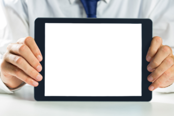 Digital png photo of caucasian businessman holding tablet with copy space on transparent background