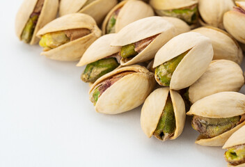 Salted Pistachios for Beer, Macro, Spin. Isolated Background of a Beer Snack of Salted Pistachio...