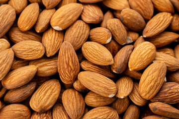 Almond nuts close up. Nut almond close up. Product rich in minerals and vitamins. Almond kernels. Texture of Almond kernels.