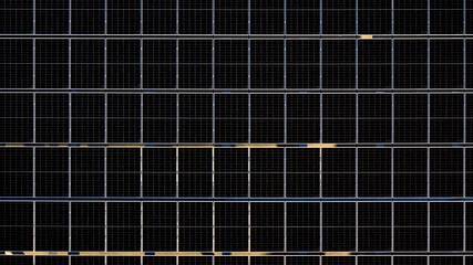 Aerial view of solar panels installed on the roof of an industrial building. Solar energy accumulators. Green economy concept.