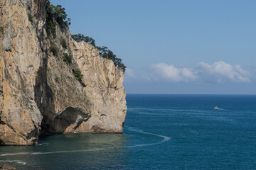 Obraz premium cliffs of Del Caballo lighthouse, Buciero mountain, Santoña, Cantabria, Spain