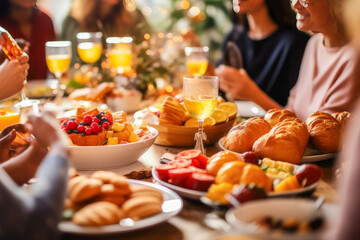People enjoying brunch or breakfast on New Year's Day - obrazy, fototapety, plakaty