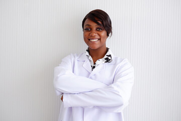 Young female doctor standing and smiling medical concept.