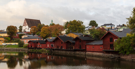 Fototapeta na wymiar Porvoo, Finland. Old wooden red houses in old town of Porvoo