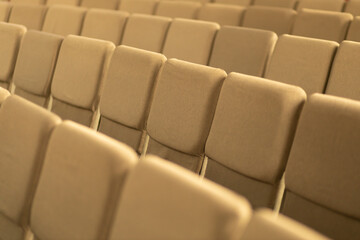 Fototapeta premium Empty chairs in the hall. The conference hall is empty. Social distance.