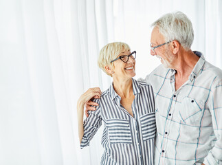 senior woman man couple happy retirement love elderly portrait male old together adult mature retired wife family wife husband hug romance bonding active vitality