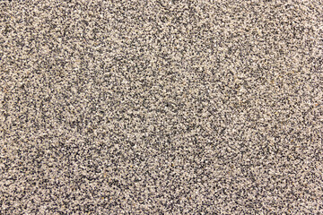 texture of tiles made of pressed river quartz sand close-up