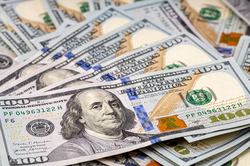 Money, US dollar bills background. Money scattered on the desk.