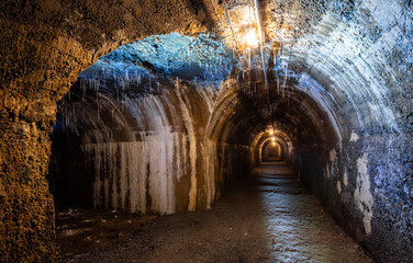 Historic bunker tunnels with junction from world war 2 built with reinforced concrete now is a...