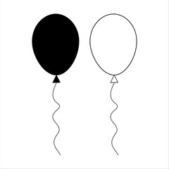 two black and white string balloons lined up in a white box