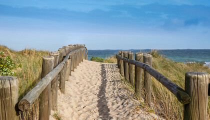 dunes, wooden railings and sea,