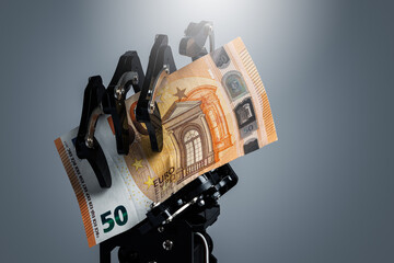 Robotic hand holding hundred euro banknote. Investment in Artificial Intelligence technology and...