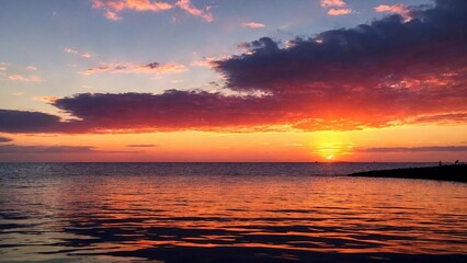 Stunning sunset on the lake, purple sky.