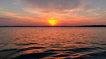 Fototapeta premium Stunning sunset on the lake, purple sky.