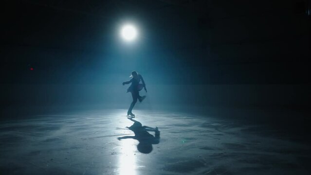 Woman Champion Of Figure Skating On Ice Rink In Darkness, Professional Figure Skating Sport