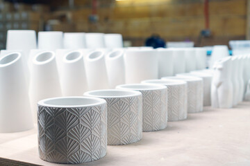 Finished plaster products: vases, figurines, bowls. Making and casting decorative dishes and vases...