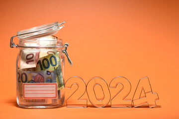 Argent monnaie banque epargne budget paiement bocal 2024