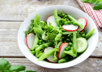 fresh lettuce and radish salad for healthy eating