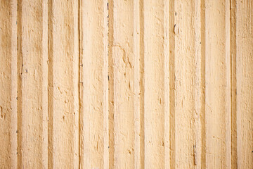 Beige paint vertical wood texture. Wooden wall background. Color vintage wood pattern. Rustic board with knots. Old peeling paint texture. Grunge cracked wooden wall background.