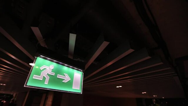The arrow shows the direction to the exit, emergency exit