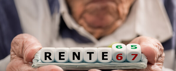 Symbol for an early retirement of 65 years in Germany. Old lady hold dice with the expression 'Rente 65' (retirement 65).